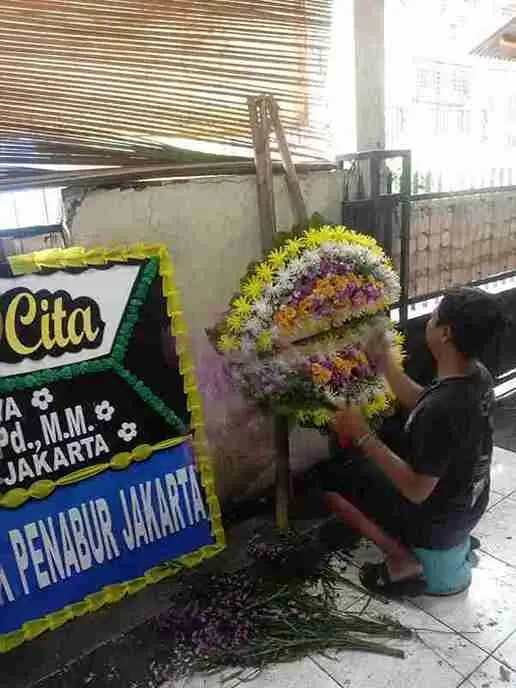 bunga papan duka cita